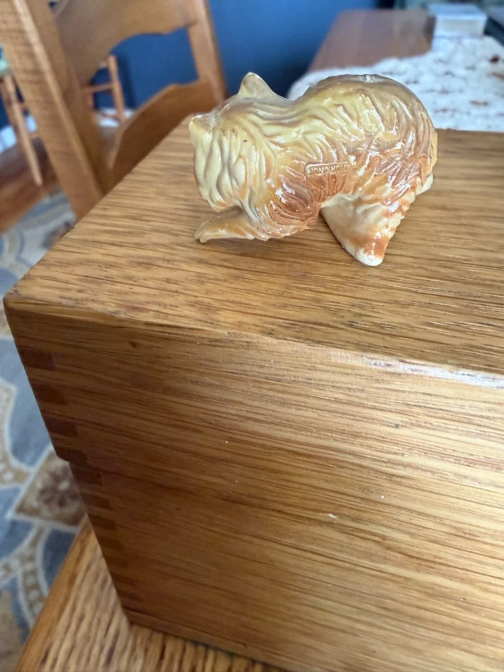 Mini pair of raccoon figurines